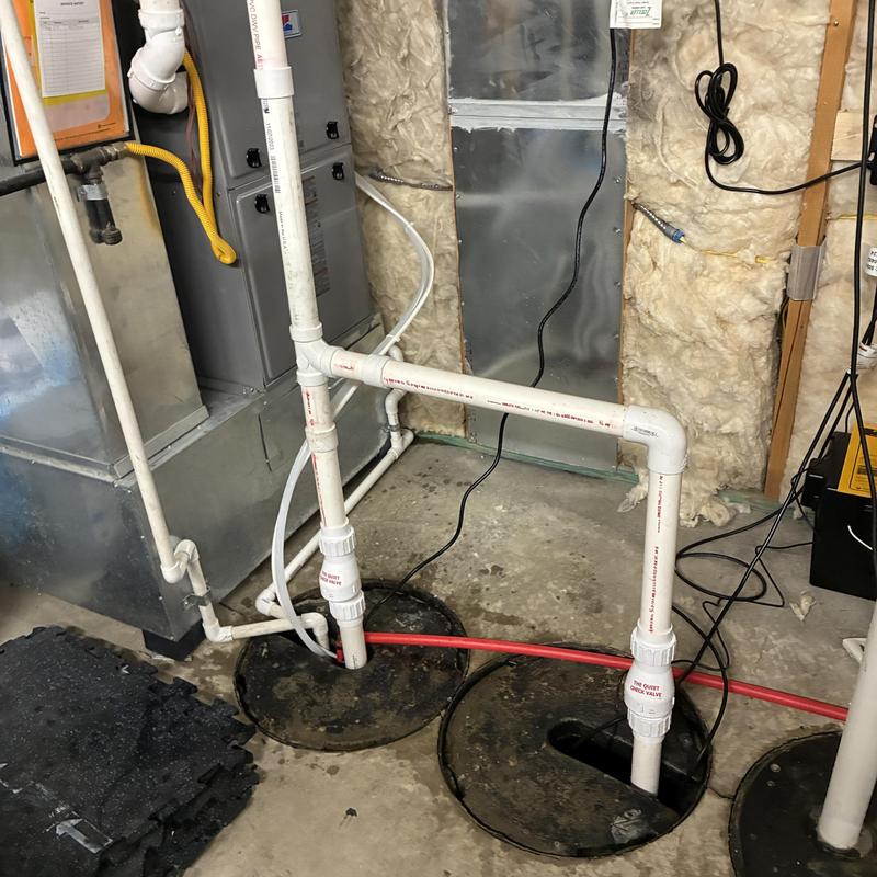 Primary sump pump and battery backup system installation