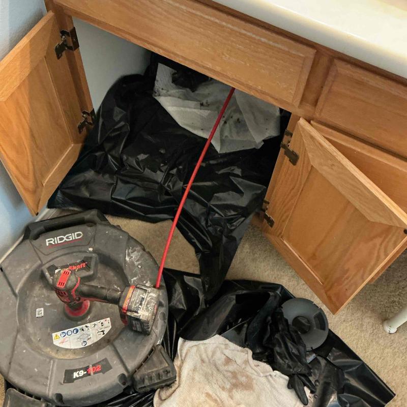 Master restroom branch drain with snaking equipment