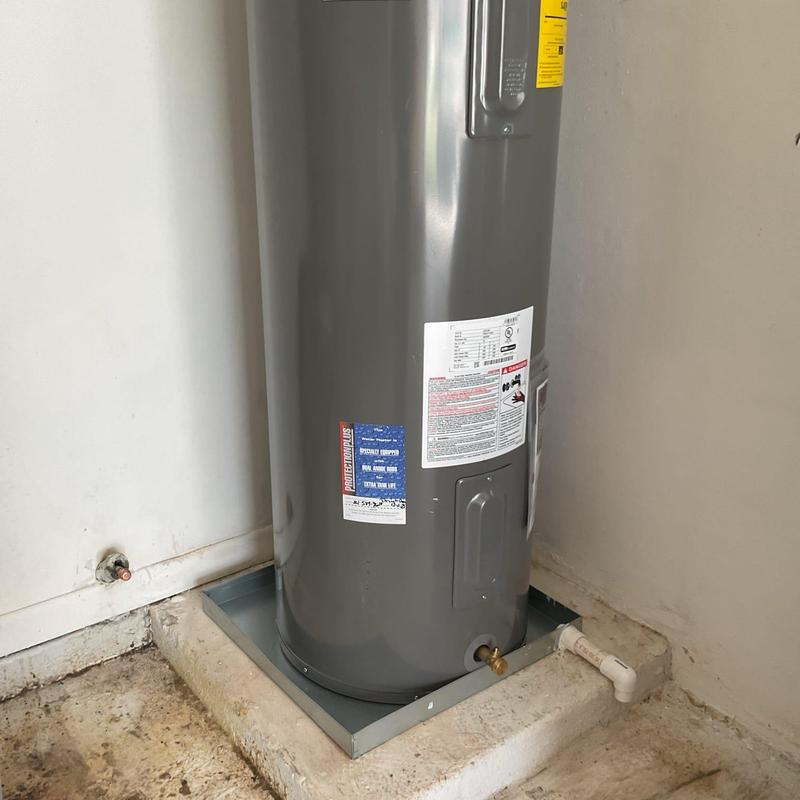Electric water heater in utility room installation