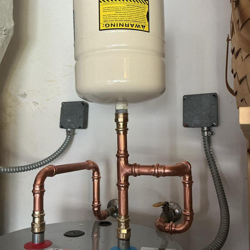 Water heater expansion tank and copper piping installation