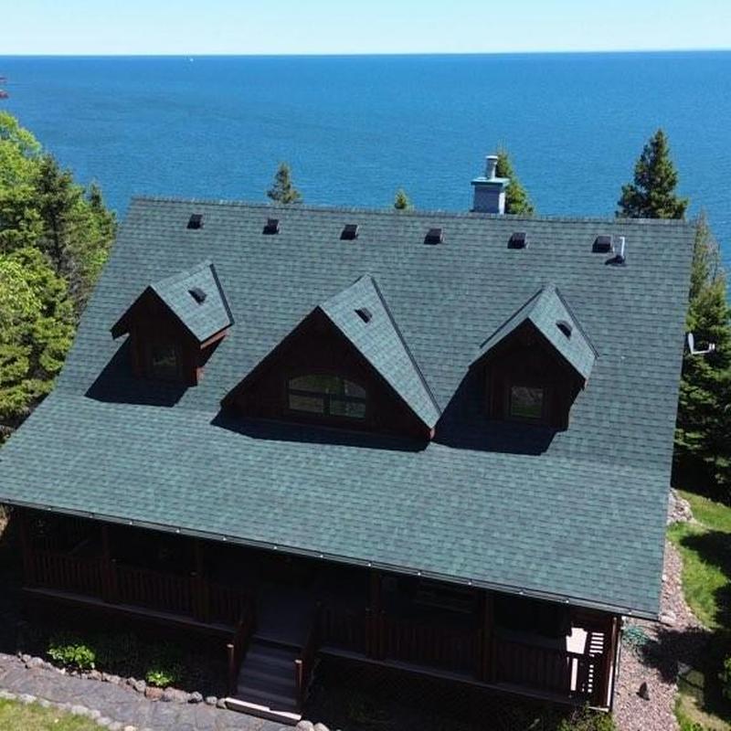 CertainTeed ClimateFlex roofing shingles in Hunter Green CertainTeed ClimateFlex roofing shingles in Hunter Green