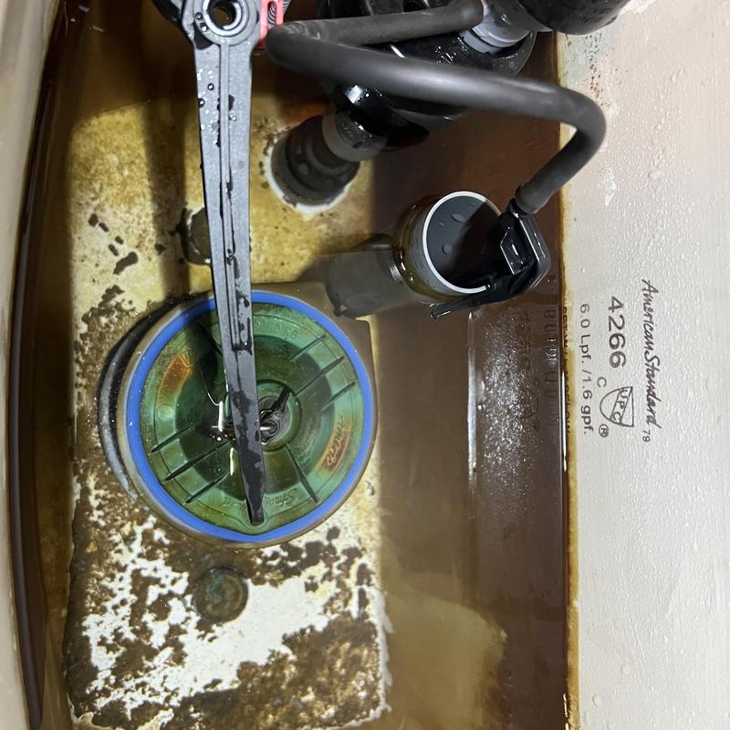 Toilet flapper and gasket inside tank replacement