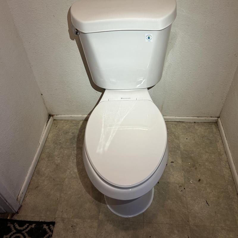 Toilet with shut off valve and waterline installed