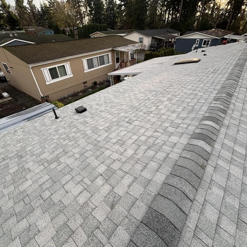 Asphalt shingle roof with ridge vent installed