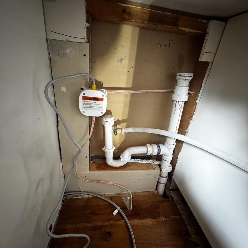 Dishwasher drain and water supply installation pipes