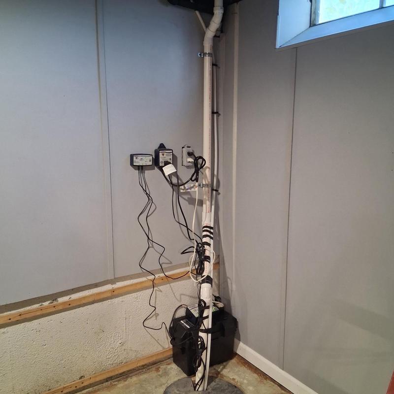 Sump pump and battery backup system installation