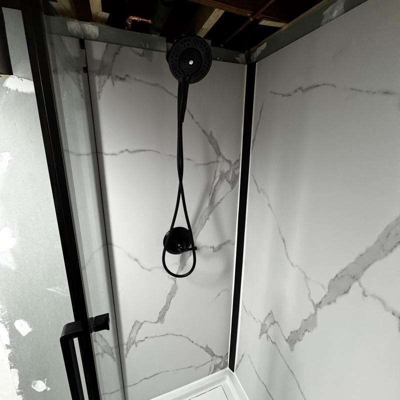 Glass shower door and valve trim installation