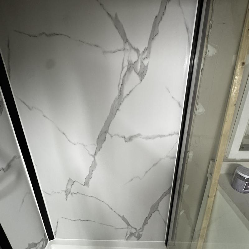 Shower valve trim and glass door installation