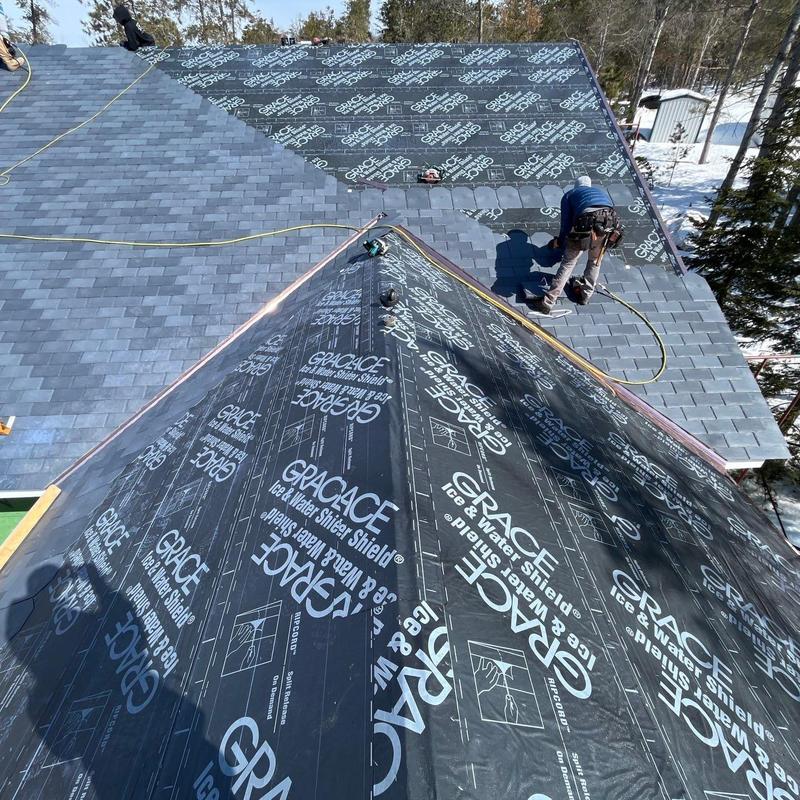 Synthetic slate roof installation with ice shield membrane Synthetic slate roof installation with ice shield membrane