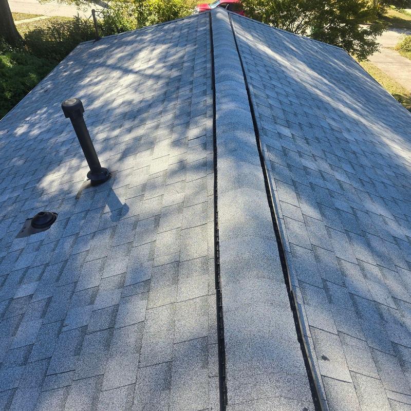 Atlas Pristine Lifetime Oyster shingles on roof ridge Atlas Pristine Lifetime Oyster shingles on roof ridge