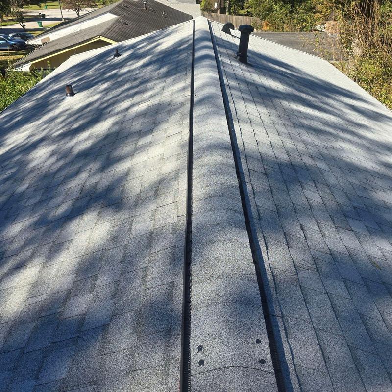 Atlas Pristine Lifetime Oyster shingles on roof ridge Atlas Pristine Lifetime Oyster shingles on roof ridge