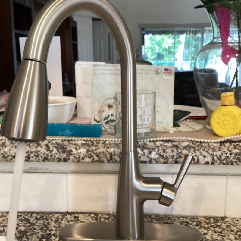 American Standard kitchen sink faucet with water flow