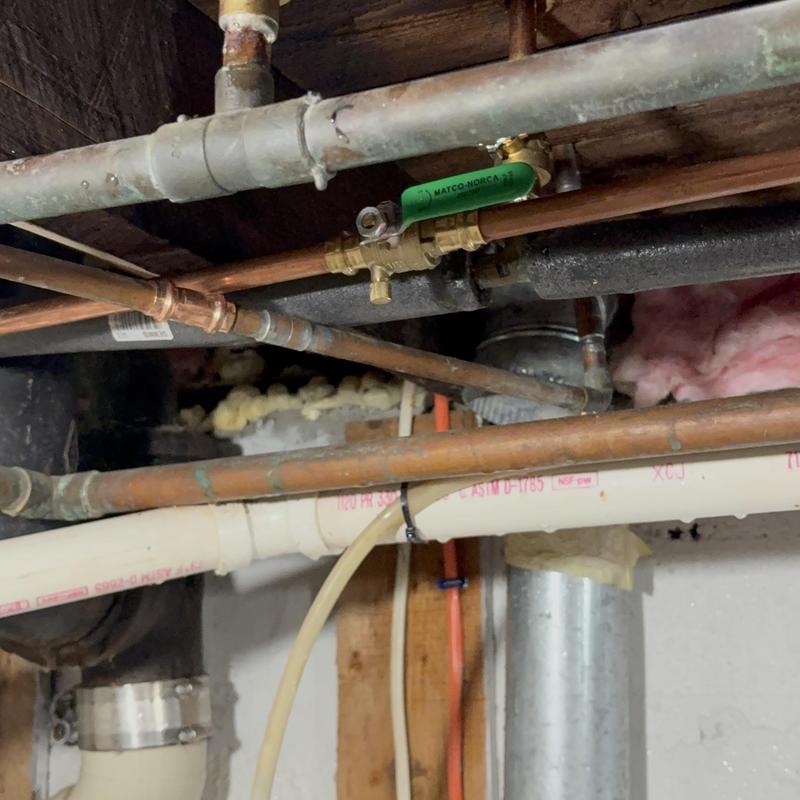 PEX water lines with shutoffs and drains in basement