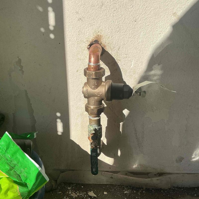 1-inch Wilkins pressure regulator installed on water line