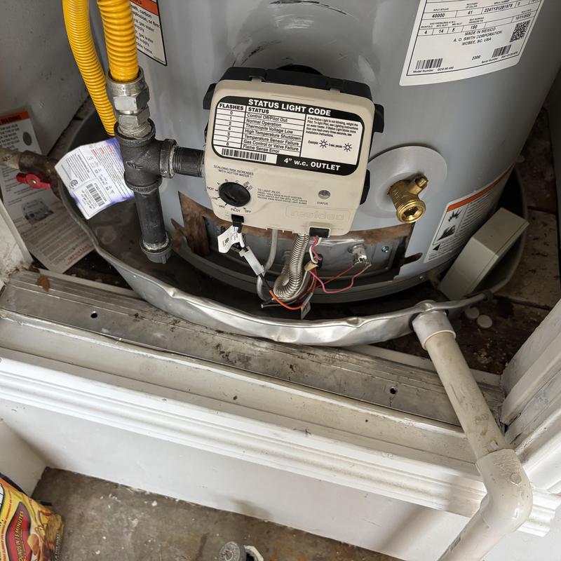 Gas water heater control valve and piping installation