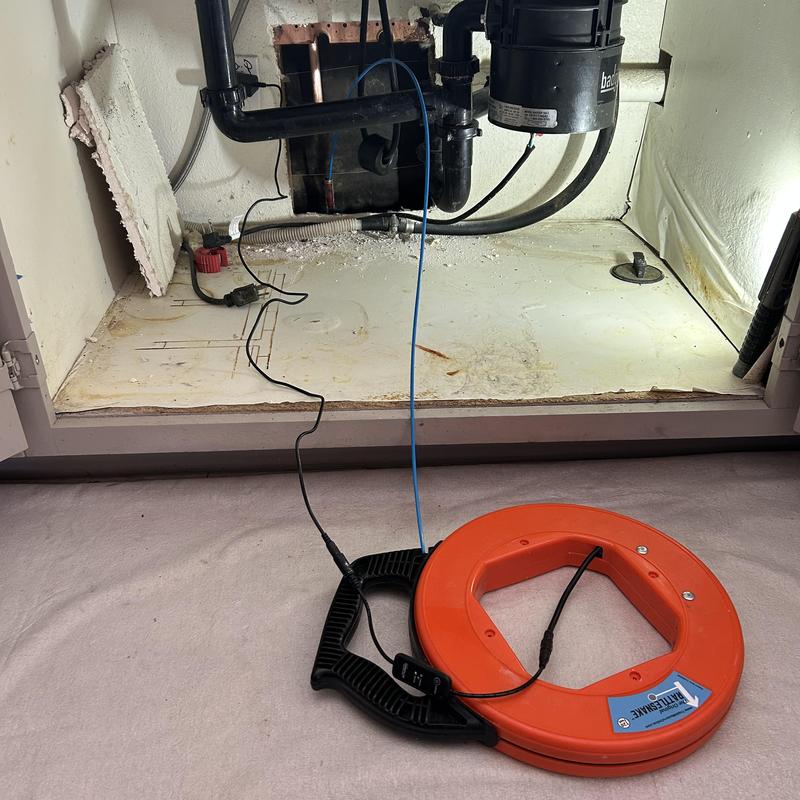 Kitchen sink drain pipe with electronic inspection tool