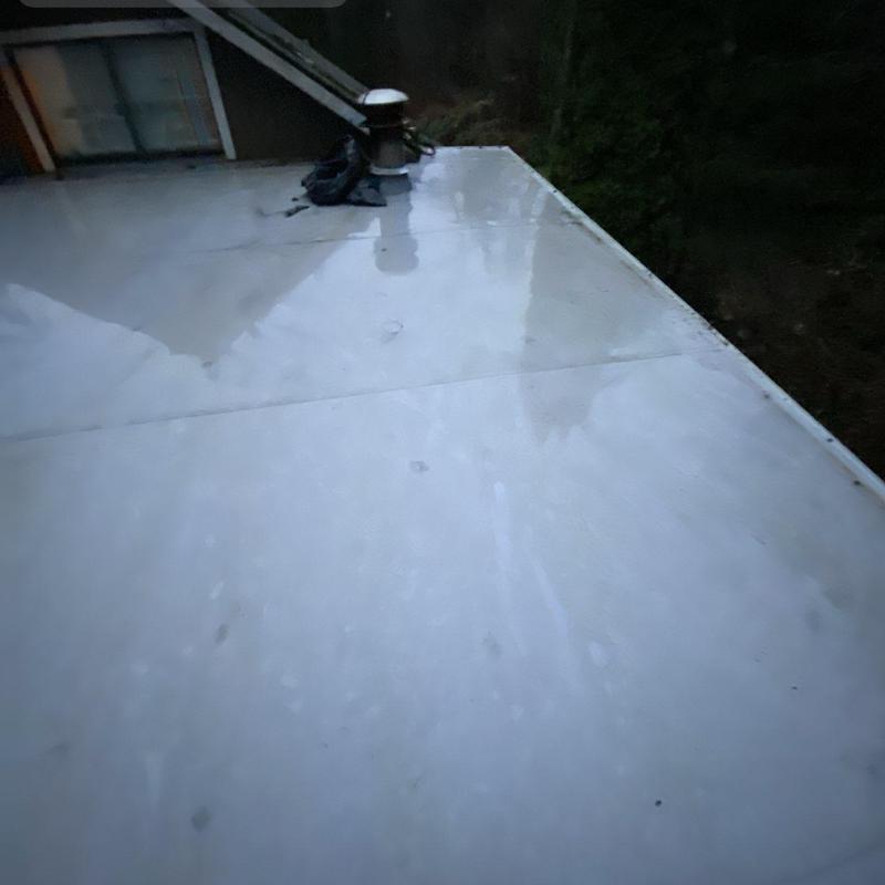 Flat roof surface after professional cleaning in Woodinville