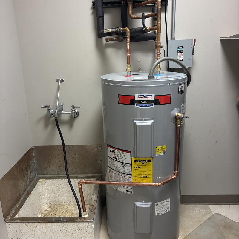 Electric water heater with new copper piping installation