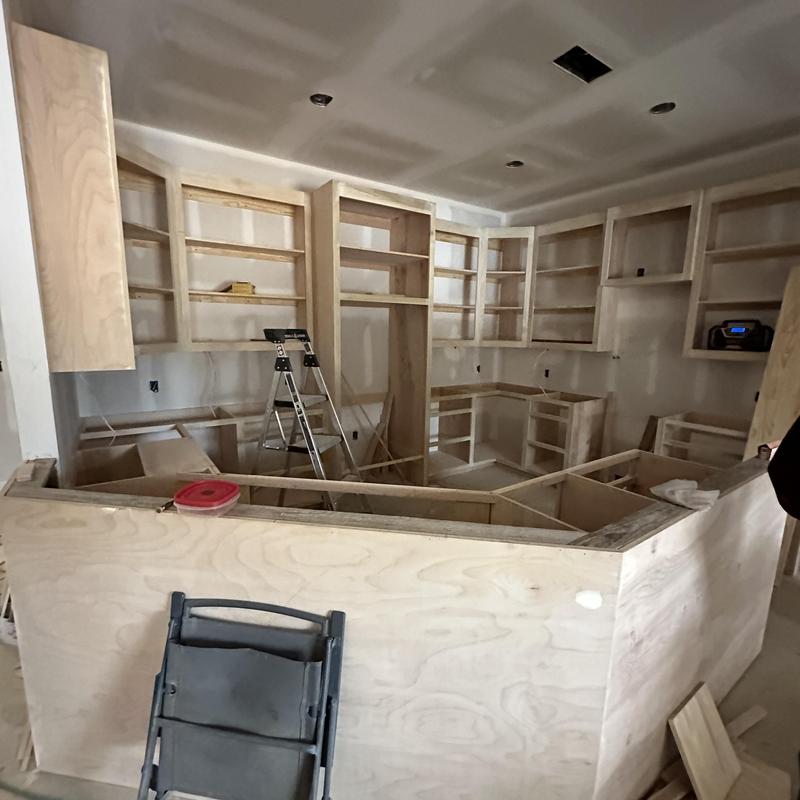 Custom kitchen cabinet boxes installation in progress Custom kitchen cabinet boxes installation in progress