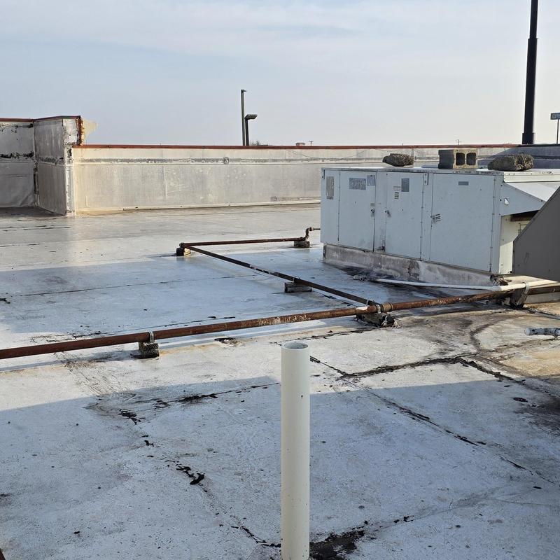 TPO roof membrane with HVAC unit on rooftop