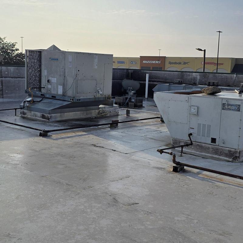 Rooftop HVAC units on commercial flat roof