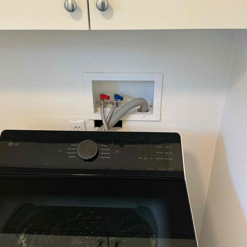 Laundry valve box with new supply lines installed