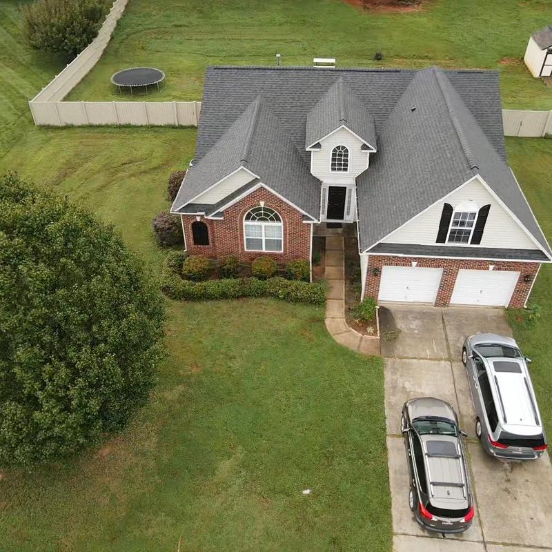 Estate Grey Owens Corning roof replacement on brick home