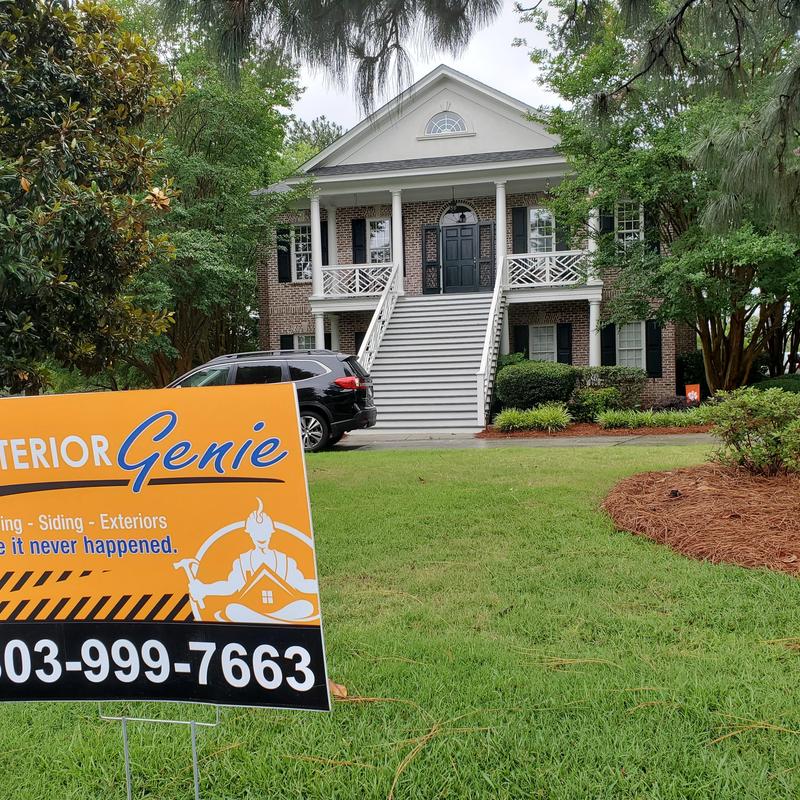 Brick house exterior with siding and porch stairs