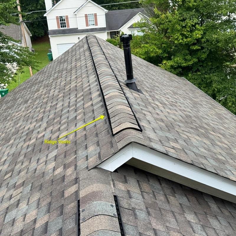 Atlas Pristine Lifetime shingles with ridge vents on roof Atlas Pristine Lifetime shingles with ridge vents on roof