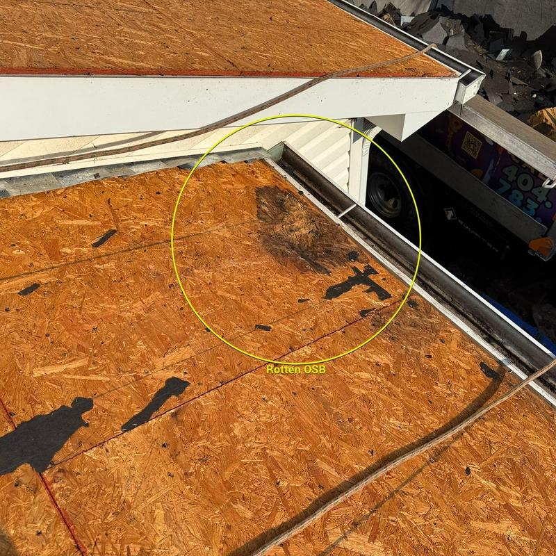 Rotten OSB roof decking on residential roof Rotten OSB roof decking on residential roof