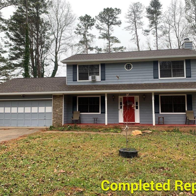 Atlas Pristine Lifetime shingle roof with new gutters Atlas Pristine Lifetime shingle roof with new gutters