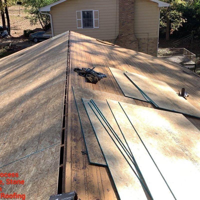 OSB roof decking installation on storm-damaged roof OSB roof decking installation on storm-damaged roof