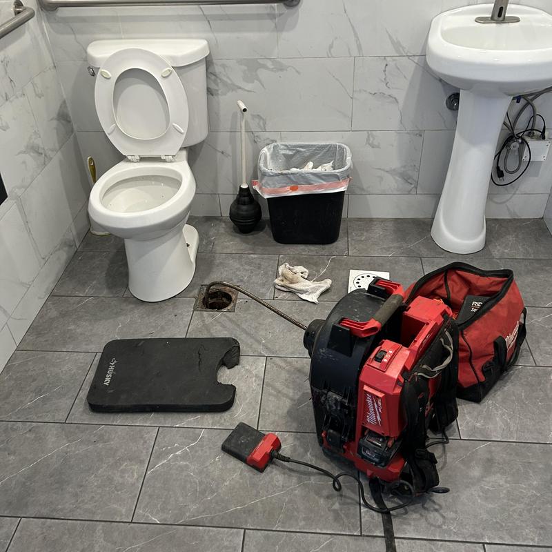 Toilet drain cleaning machine with plumbing tools
