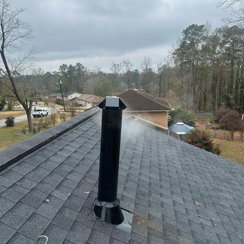 HVAC vent pipe with new exhaust cap on shingle roof HVAC vent pipe with new exhaust cap on shingle roof