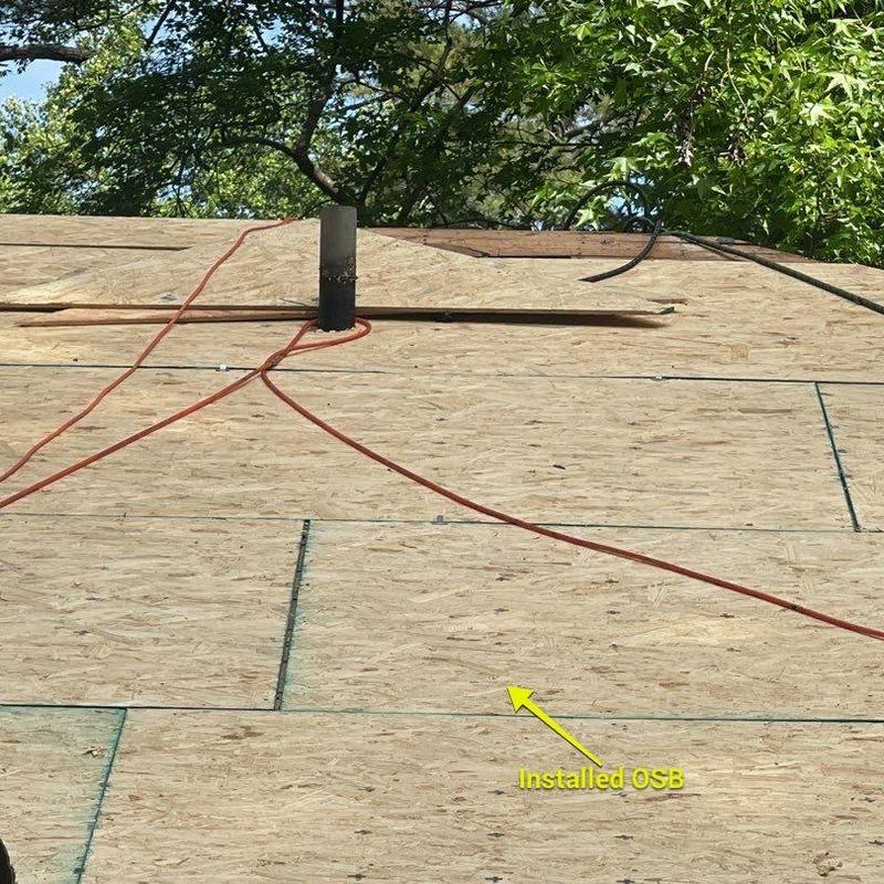 OSB roof decking installation with vent pipe and cords OSB roof decking installation with vent pipe and cords