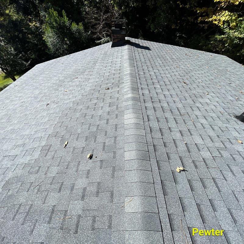 Atlas Pristine Lifetime shingles Pewter on roof ridge Atlas Pristine Lifetime shingles Pewter on roof ridge