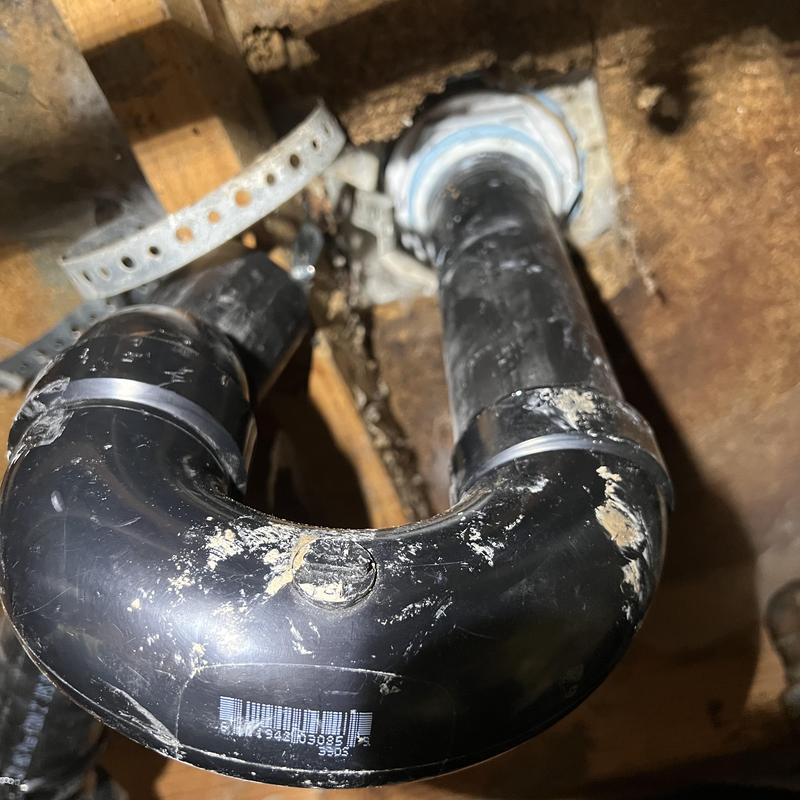 Shower drain and 2-inch P-trap installation under house