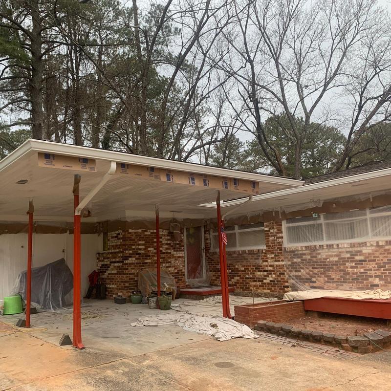 Carport ceiling and support beam restoration with brick facade Carport ceiling and support beam restoration with brick facade