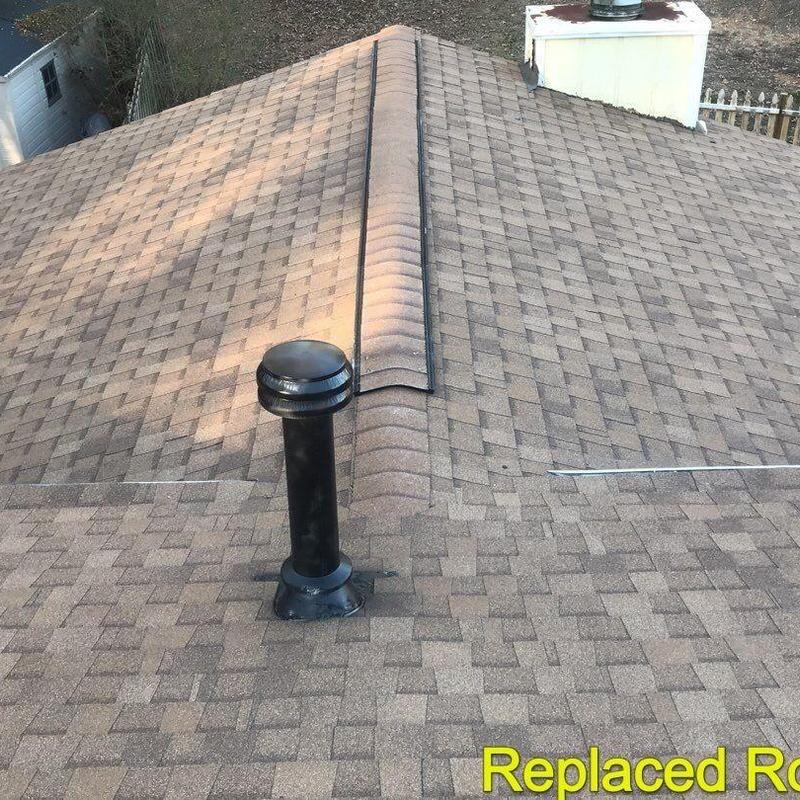 Atlas Pristine Lifetime Desert shingles on roof ridge Atlas Pristine Lifetime Desert shingles on roof ridge