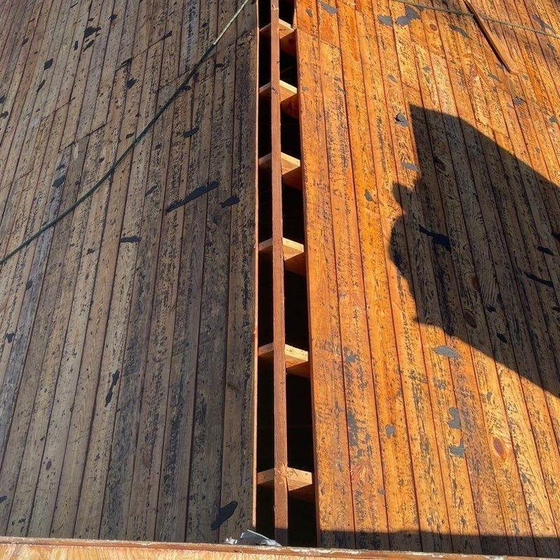 Wood roof decking with new OSB boards installed Wood roof decking with new OSB boards installed