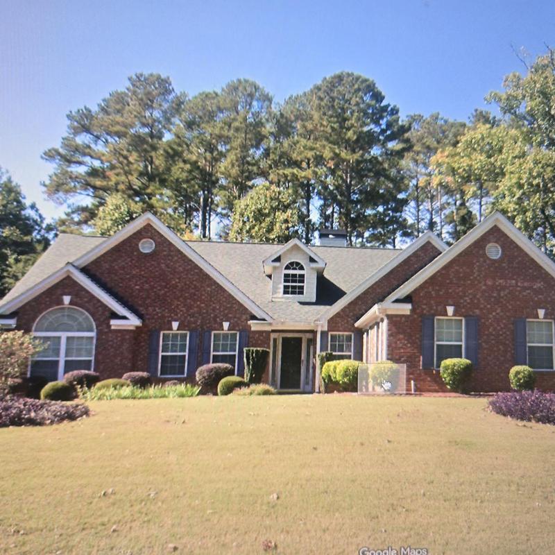 Owens Corning Estate Gray shingles on brick home roof Owens Corning Estate Gray shingles on brick home roof