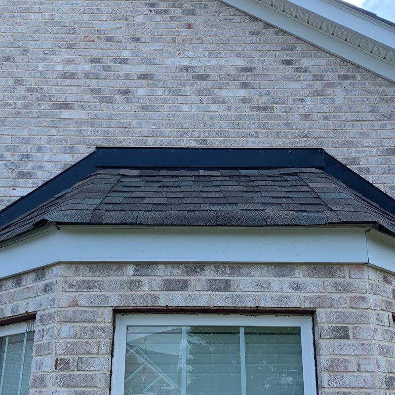 Atlas Pristine Lifetime roof shingles on bay window roof Atlas Pristine Lifetime roof shingles on bay window roof