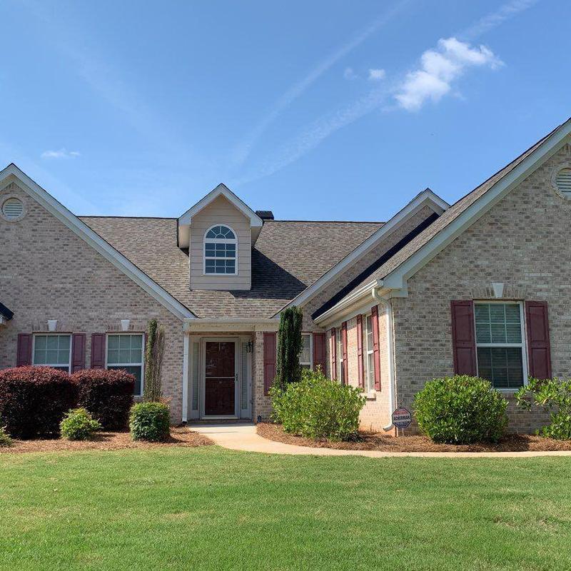 Atlas Pristine Lifetime shingles on brick home roof Atlas Pristine Lifetime shingles on brick home roof