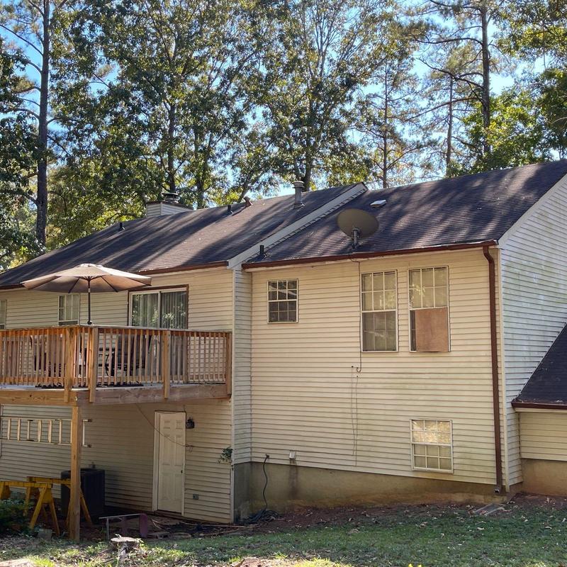 Asphalt shingle roof with gutter and deck repairs Asphalt shingle roof with gutter and deck repairs