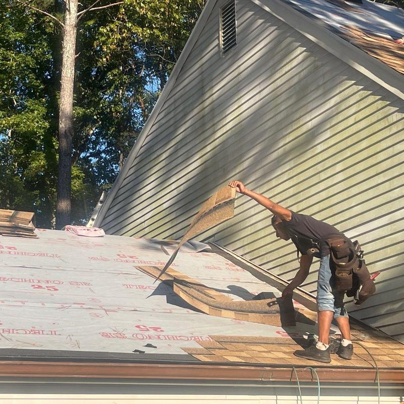 Synthetic roof underlayment installation on sloped roof Synthetic roof underlayment installation on sloped roof