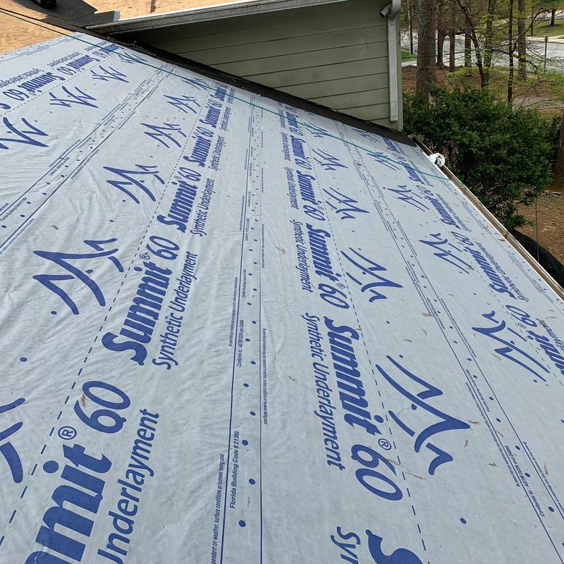 Synthetic underlayment installed on roof in Stone Mountain Synthetic underlayment installed on roof in Stone Mountain