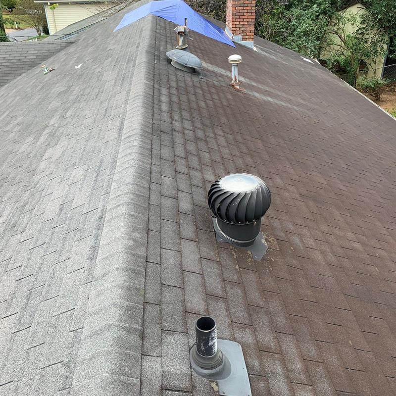 Asphalt shingle roof with ventilation pipes and flashing Asphalt shingle roof with ventilation pipes and flashing