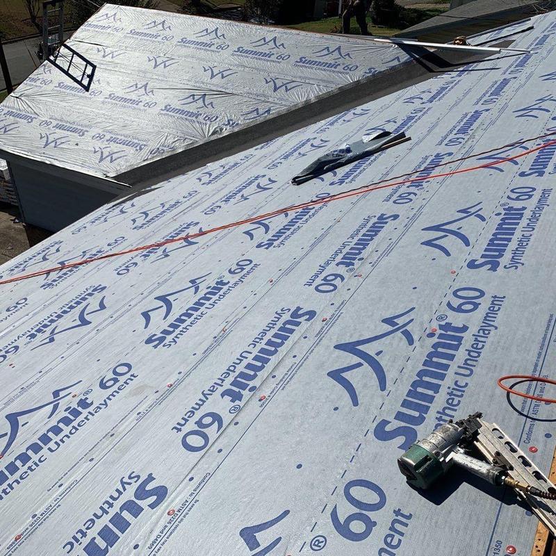 Synthetic underlayment installation on residential roof Synthetic underlayment installation on residential roof