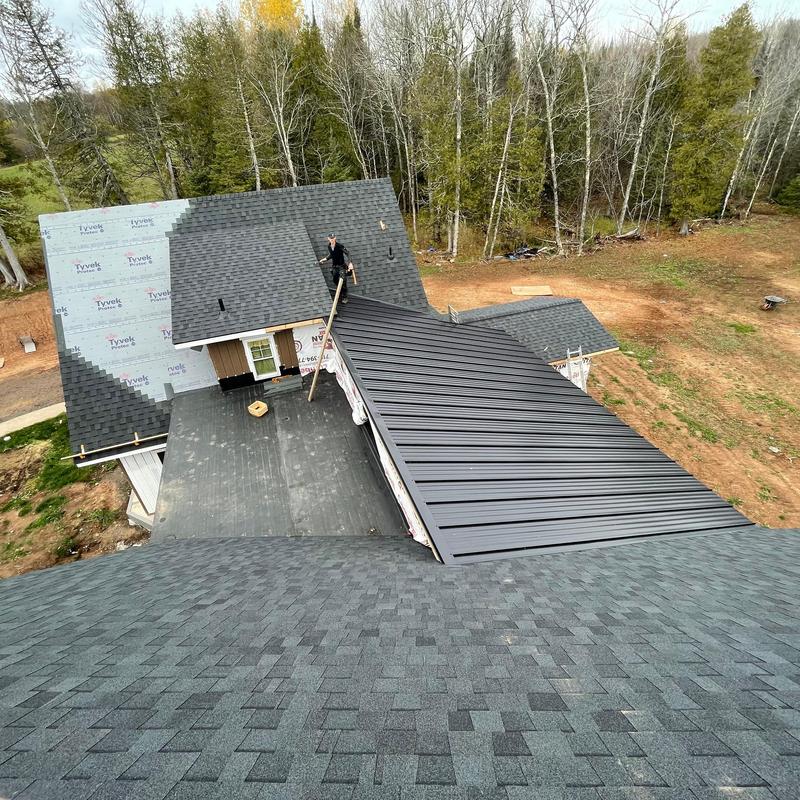 Standing Seam steel roofing and ClimateFlex SBS shingles installation Standing Seam steel roofing and ClimateFlex SBS shingles installation