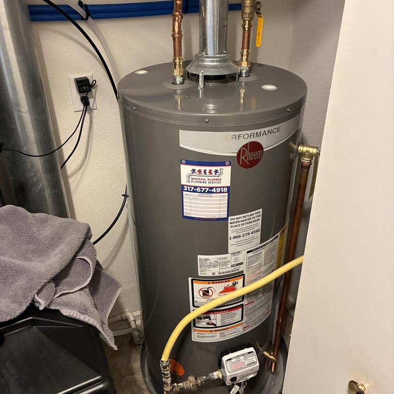 50-gallon Rheem gas water heater with new plumbing
